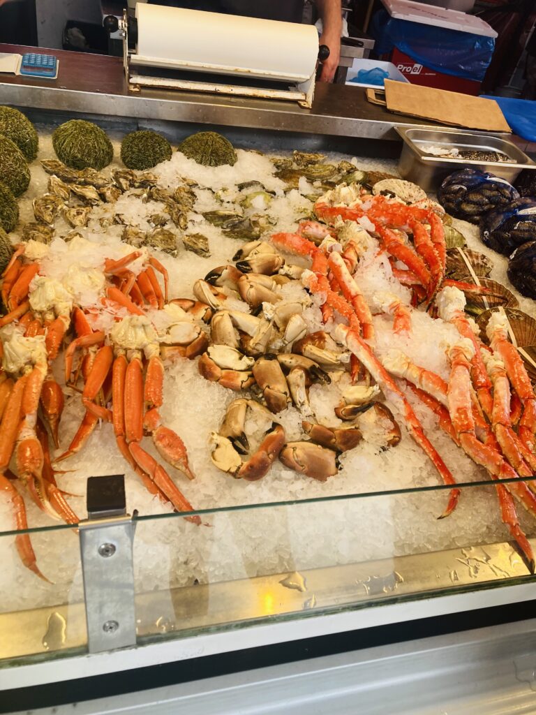 Buy fresh fish at the fish market in Bergen with kids